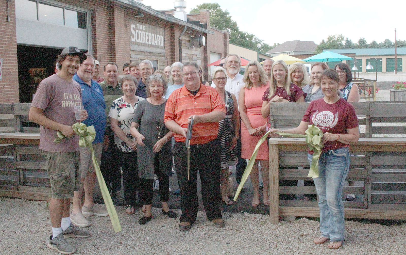 Grub Grabber ribbon cutting